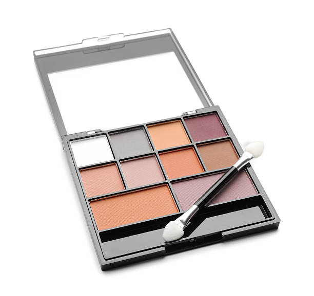 istock Beautiful eyeshadow palette with applicator isolated on white 2252381726