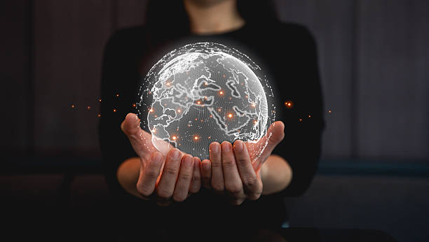 istock A person holds a glowing, digital globe with interconnected lines, symbolizing global connectivity and technology. 2252382108