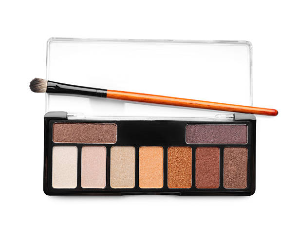 istock Beautiful eyeshadow palette with brush isolated on white, top view 2252382127
