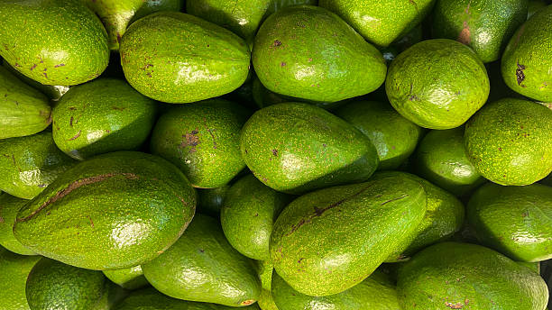 istock A Full Frame Background of Fresh Green Avocados 2252388093