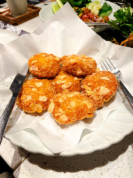 istock Fried thaicookies with almond slices 2252388246