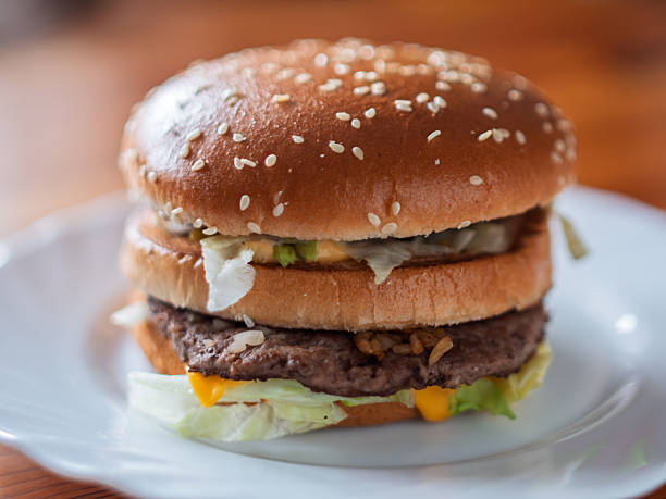 istock Juicy Beef Burger with Fresh Vegetables and Sesame Bun 2252394681
