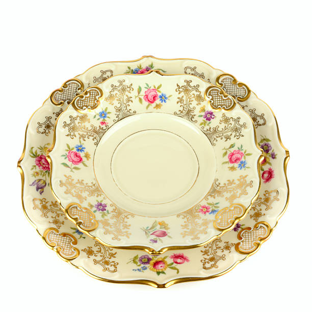istock Stack of Elegant Vintage Fine China Plates with Gold Trim 2252394785