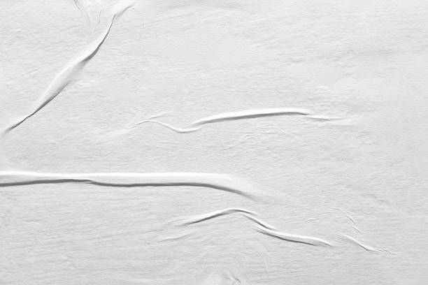 istock abstract white paper background close-up 2252394924