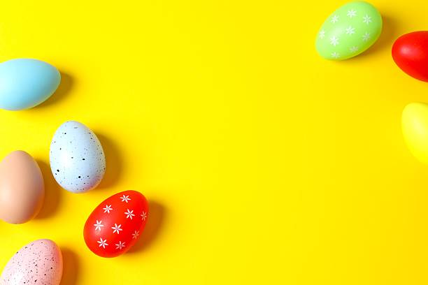 istock Happy Easter. Colorful eggs on color background 2252397533