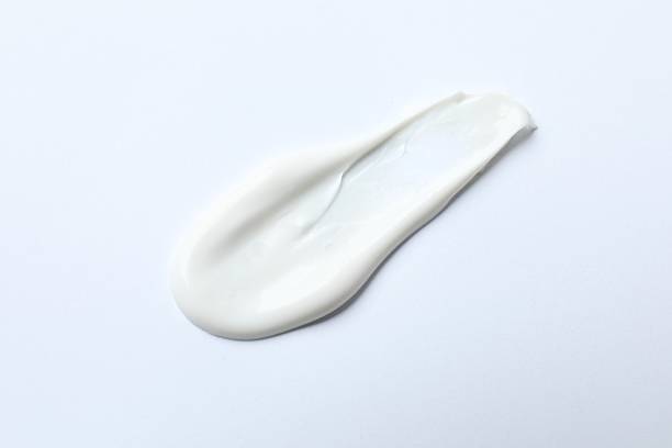 istock Smear of cream on a white background 2252403083