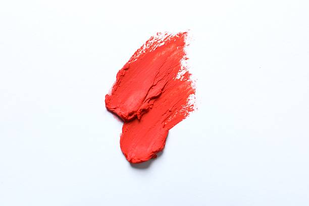 istock Smear of beautiful lipstick on white background, top view 2252403151