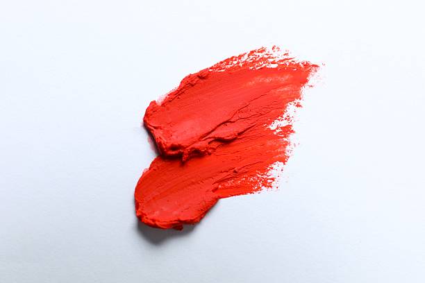 istock Smear of beautiful lipstick on white background, top view 2252403187