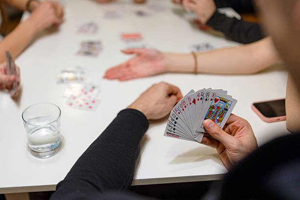 istock Detail of Card Game with Hands 2252406806