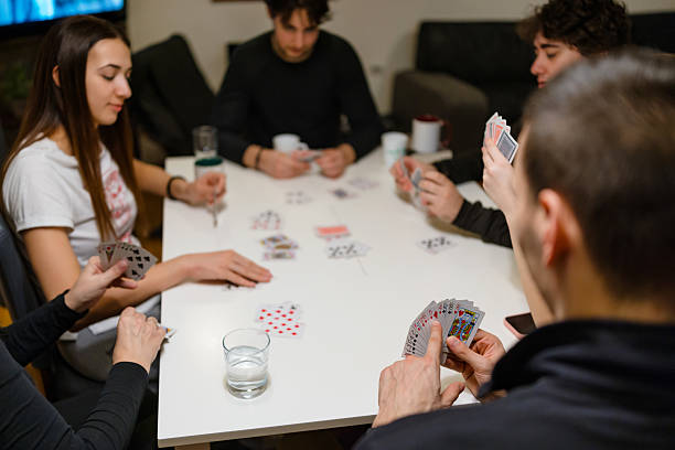 istock Friends and Relatives Enjoying Card Game 2252406868