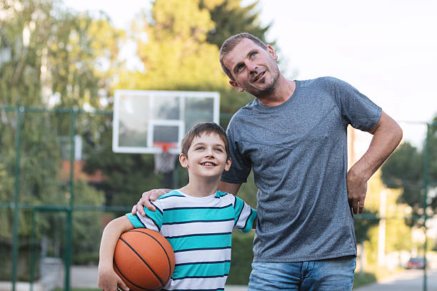 istock Father and Son Bonding at the Playground 2252407949