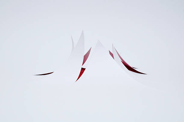 red behind cut white paper