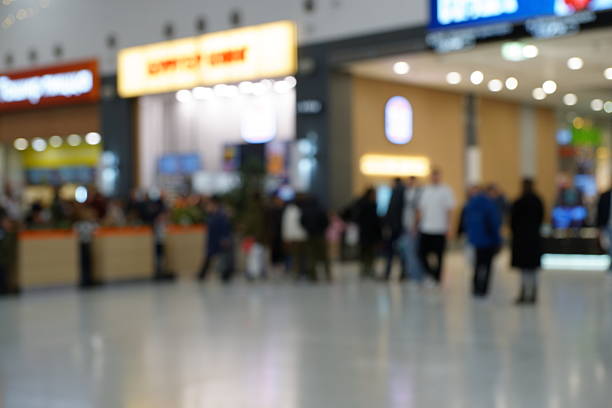 istock Blurred background. People in the mall. 2252417613