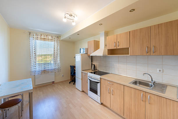 istock Modern Kitchen Interior with Wood Cabinets and Bright Natural Lighting 2252418118