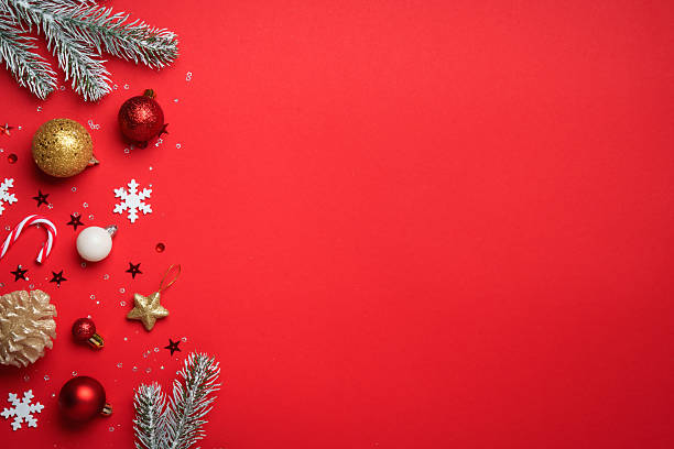 istock Christmas decorations gold red and white ornaments on red. 2252419892