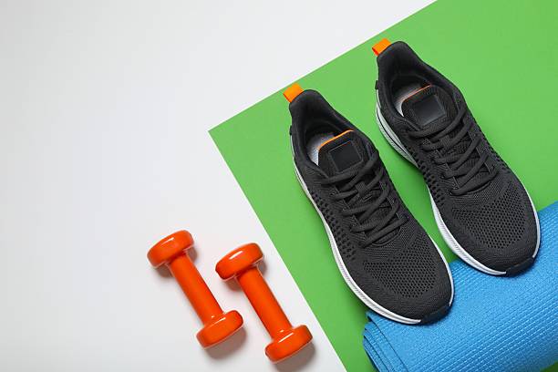 istock Sport equipment on light background, top view 2252420763