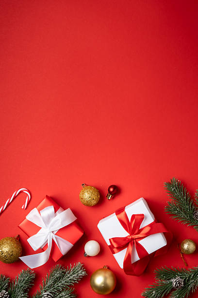 istock Christmas decorations, fir tree and gifts. Flat lay image with copy space. 2252421182