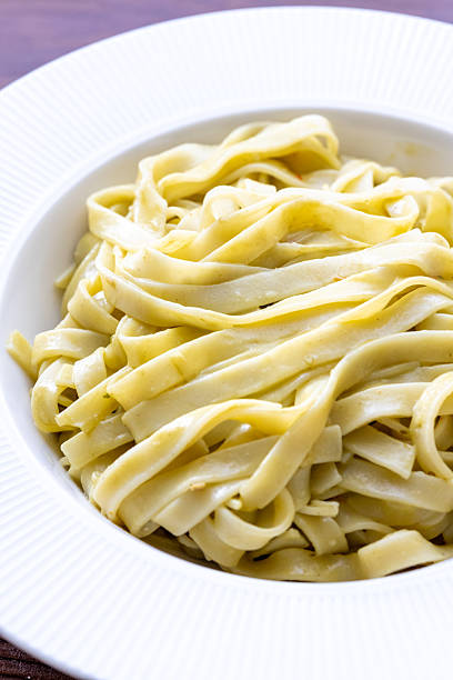 Close-Up of Creamy Pesto Tagliatelle Pasta