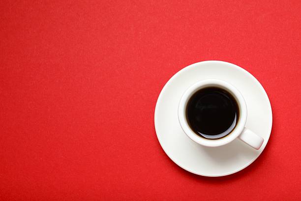 istock Cup of coffee on color background 2252422205