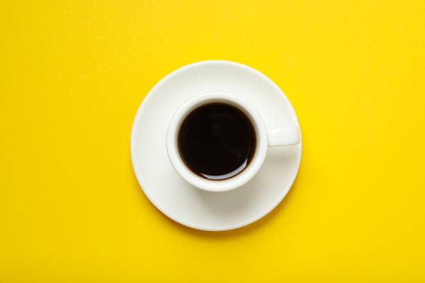 istock Cup of coffee on color background 2252422210