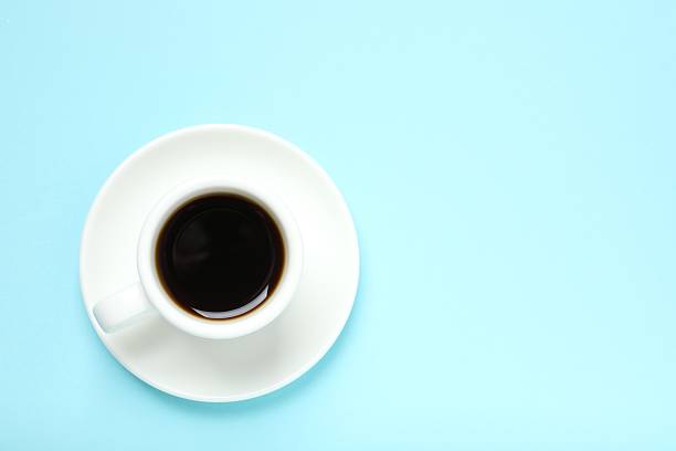 istock Cup of coffee on color background 2252422234