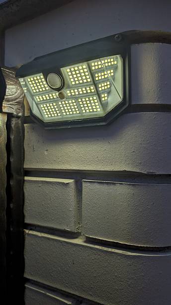 istock Wallmounted LED illuminates textured concrete with cinematic mood 2252422308