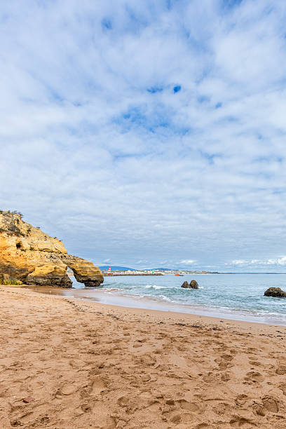 istock Praia dos Estudantes Beach Between Limestone Cliffs in Lagos, Algarve, Portugal 2252425408