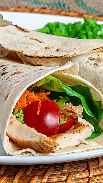 istock Wrap, tortillas filled with meat and vegetables. 2252428894