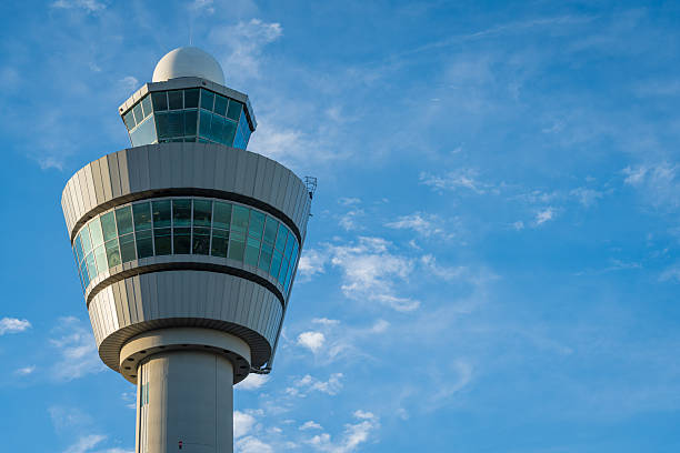 istock Modern Airport Control Tower Against a Clear Blue Sky 2252430511