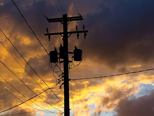 istock Storm clouds at sunset threaten the power grid 2252438003