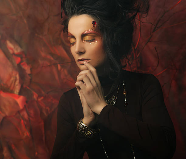 istock Beautiful brunette woman with bright creative make up 2252451690