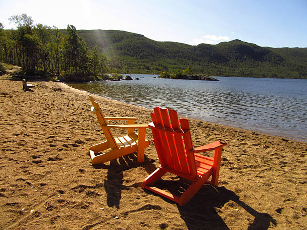 Chairs on a Lake Beach in Norway
