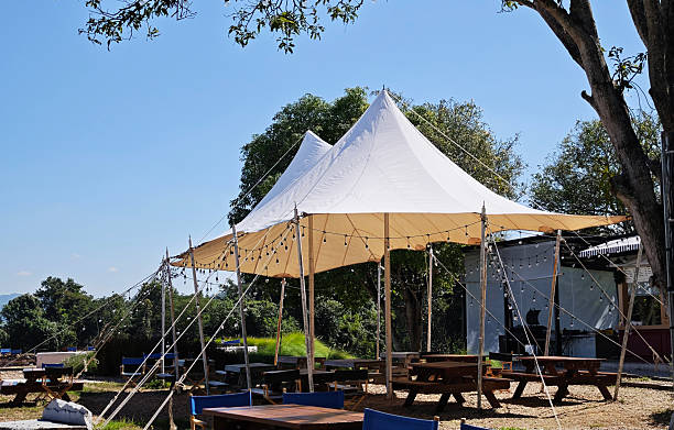 istock White Canvas tents for events on the lawn. 2252466282