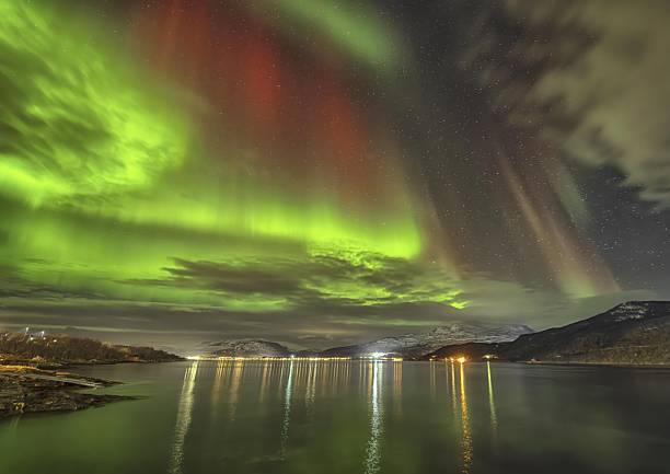 istock Aurora Borealis Over Lake in Norway under Starry Sky 2252475147