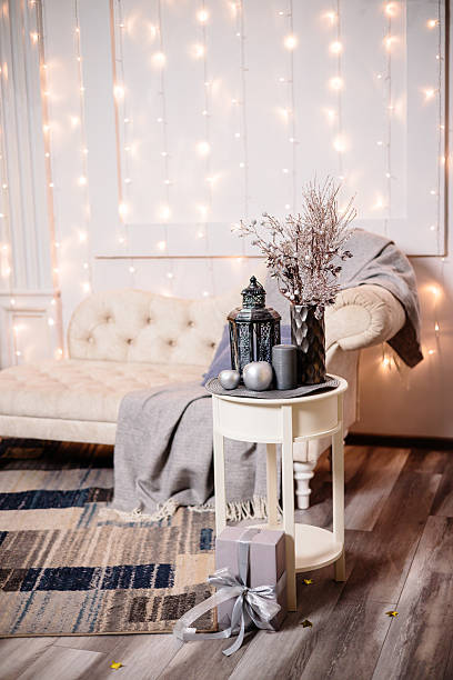 istock Decorative antique silver retro lamp on a white small table in the living room. Interior decor in the house. 2252476845