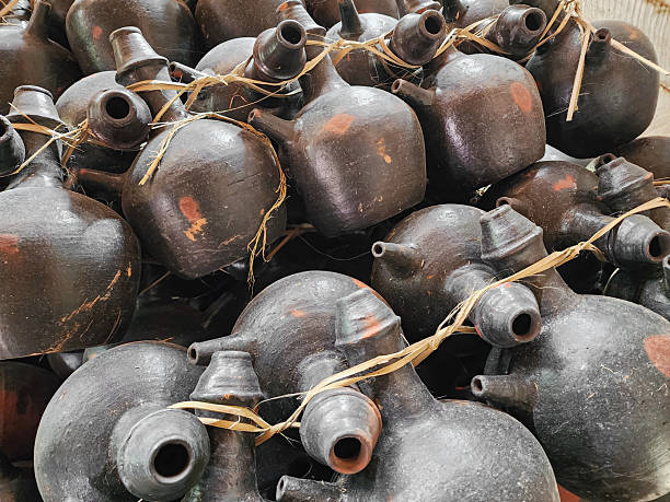 Pottery is a traditional handicraft item made from clay which is shaped into objects and heated until it becomes hard.