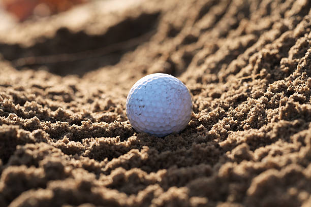 istock Used golf ball that finds itself in a difficult situation after the shot that every golfer knows 2252482155