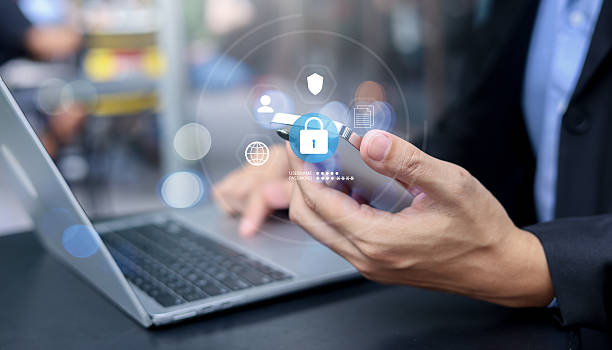 istock close up man hand use digital tablet to access account on social media network website with virtual icon of GDPR for security personal information concept 2252482467