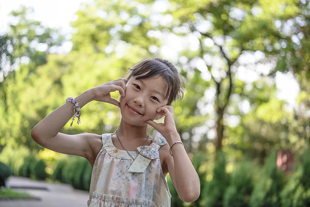 Asian girl smiling at the camera