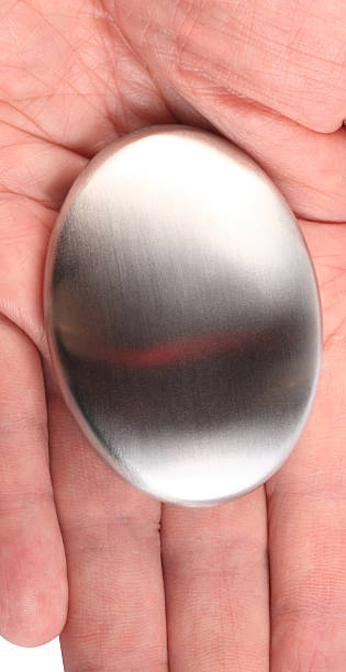 hand with Stainless Steel Soap isolated on white background