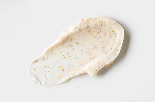 istock cosmetic smear scrub cream texture on a light background 2252494211