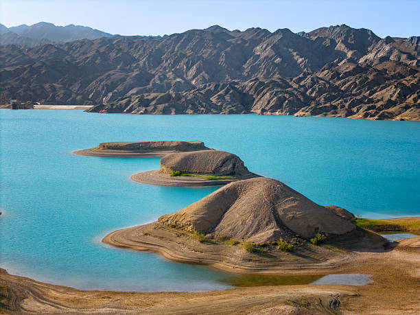Nestled in Gansu, Heishan Lake is a hidden gem where vivid turquoise waters contrast sharply with the surrounding arid desert and unique rocky islands. Its surreal, colorful landscape—shaped by natural erosion—makes it a stunning spot for aerial views and nature lovers.