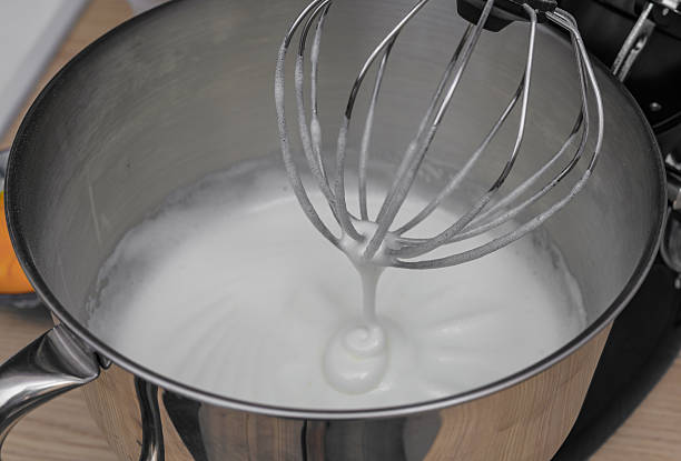 istock Egg whites beaten stiff in a food processor 2252500560