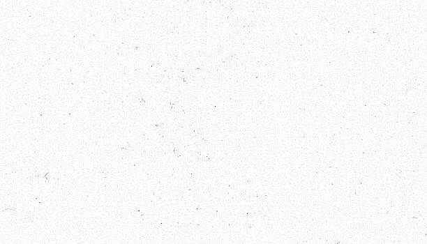istock White textured paper background with subtle speckles, ideal for design projects 2252501898