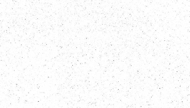 istock White speckled texture with black dots, resembling minimalist abstract pattern. Ideal for backgrounds or design elements 2252501904
