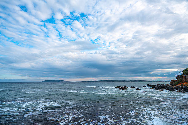 The scenic views of Akliman, which is a natural bay and port, include fishing boats and some small piers in Sinop, Turkey