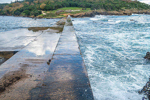 Breakwater in the fishing village of Luanco, Asturias, Spain
