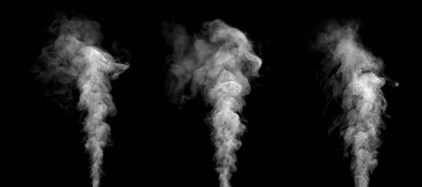 istock Realistic white smoke plumes rising on a black background, perfect for visual effects, product design, advertising, and creative projects that require natural vapor texture and atmospheric mood. 2252511621