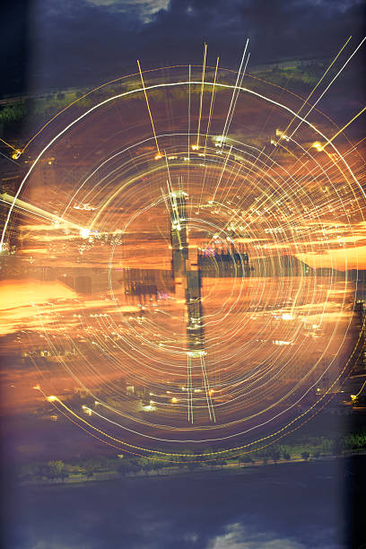 istock Abstract Circular Light Trails Over City Skyline At Dusk 2252512990