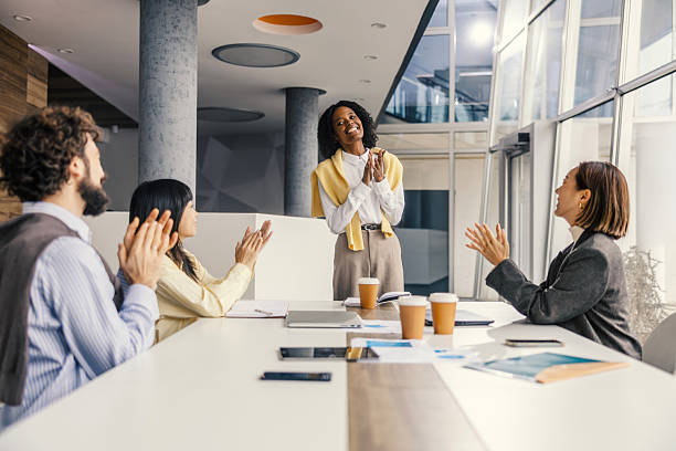 istock Diverse business team applauding successful presentation in modern office 2252513550